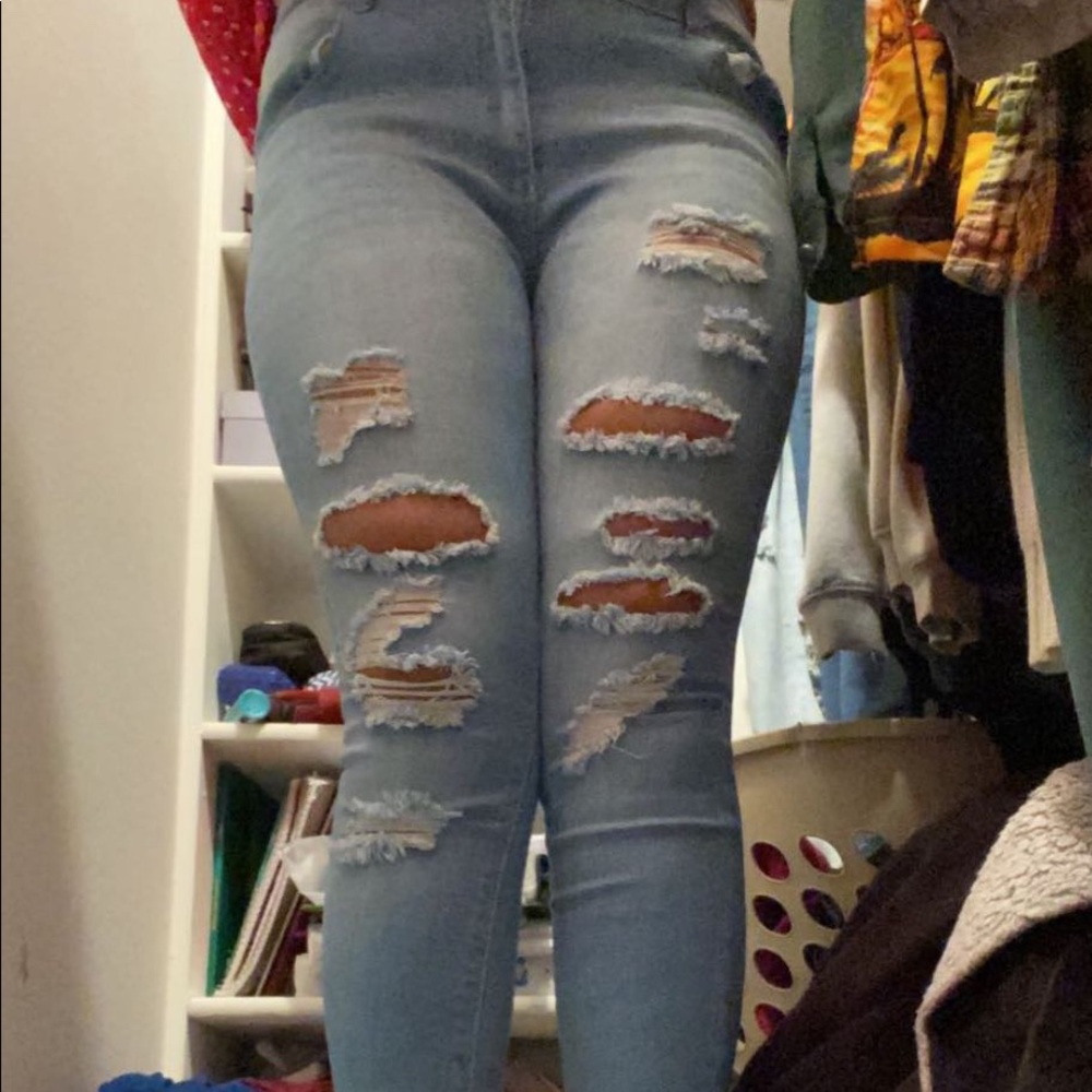 Faded Distressed Jeans.
